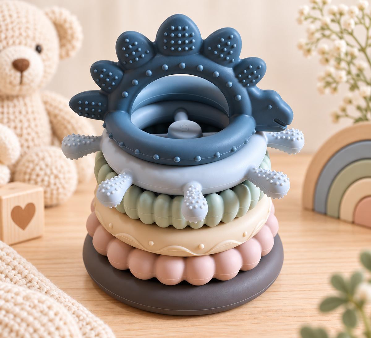 Navy, light blue, mint, yellow, pink and brown teether and stacking toy for baby boys