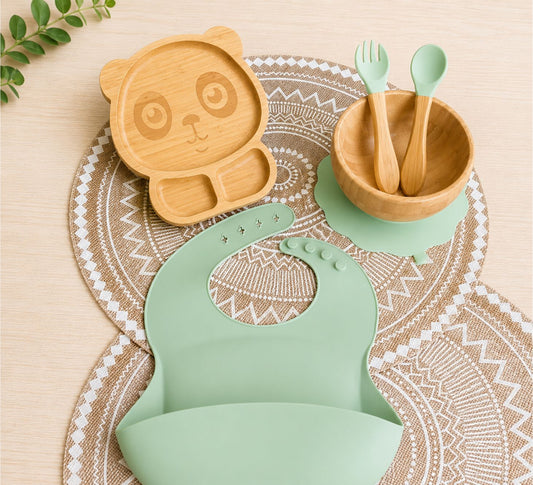Children dinning set with bamboo plate, bamboo bowl, fork and spoon and silicone bib in green
